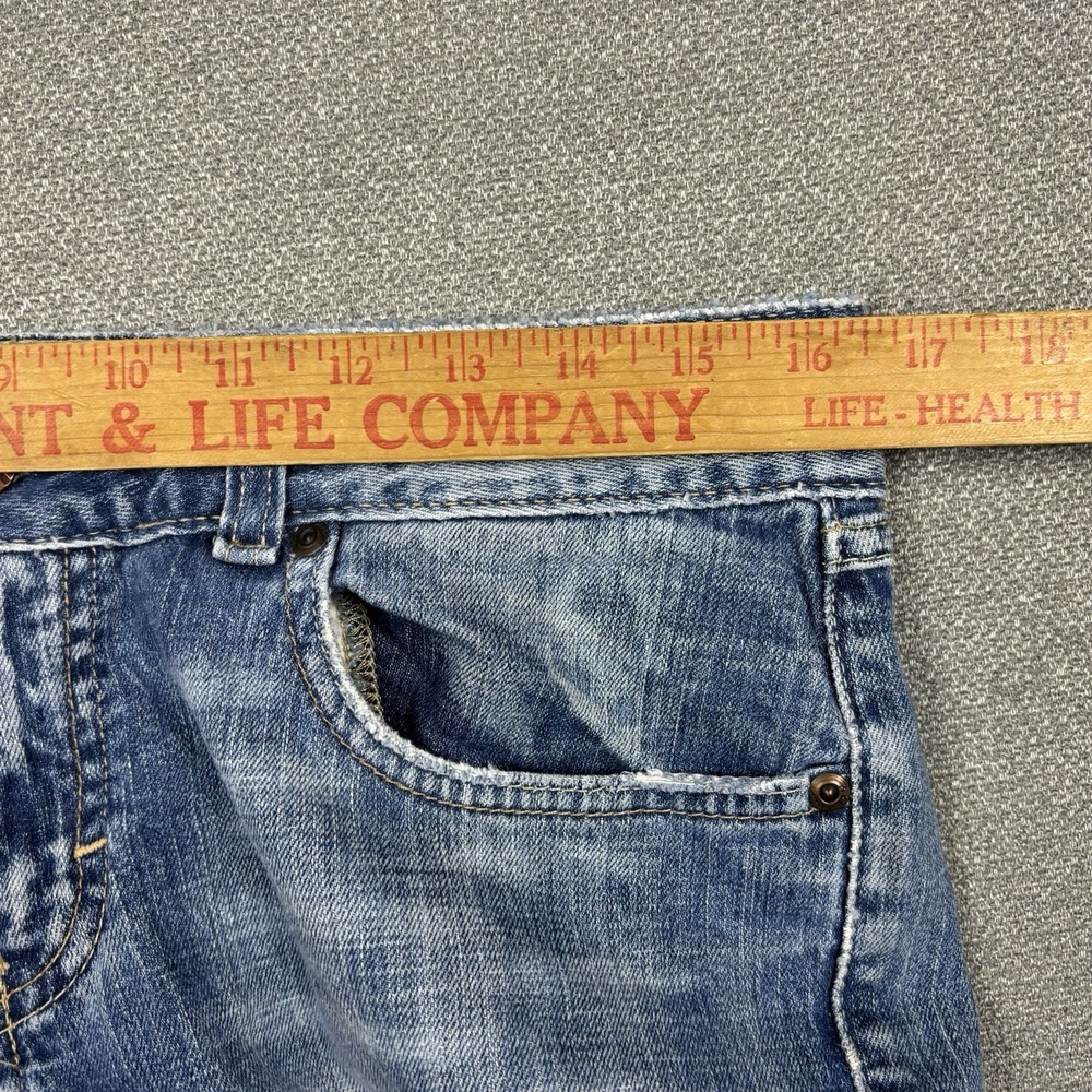 Worn-In Blue Flare Jeans - Women's Distressed Denim - Picture 5 of 8